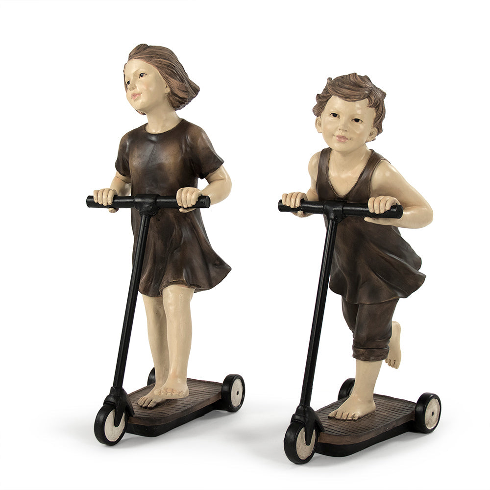 Boy on Scooter Statuette